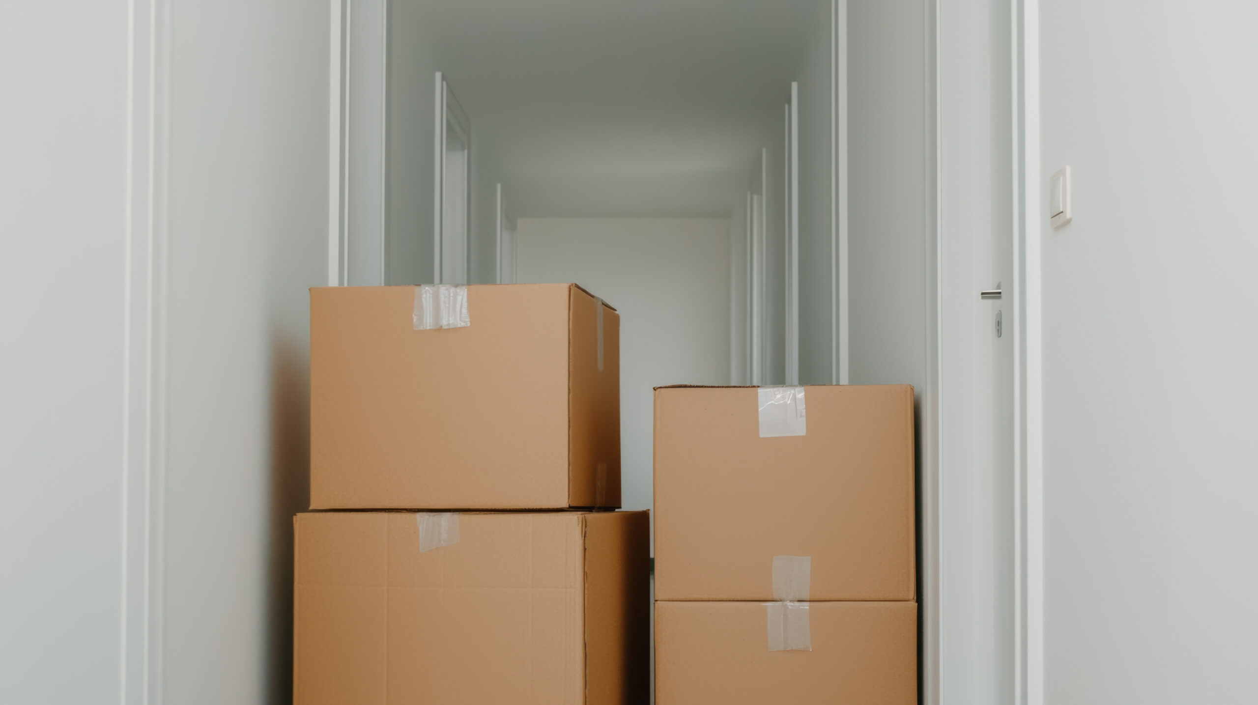 Boxes stacked in an apartment.