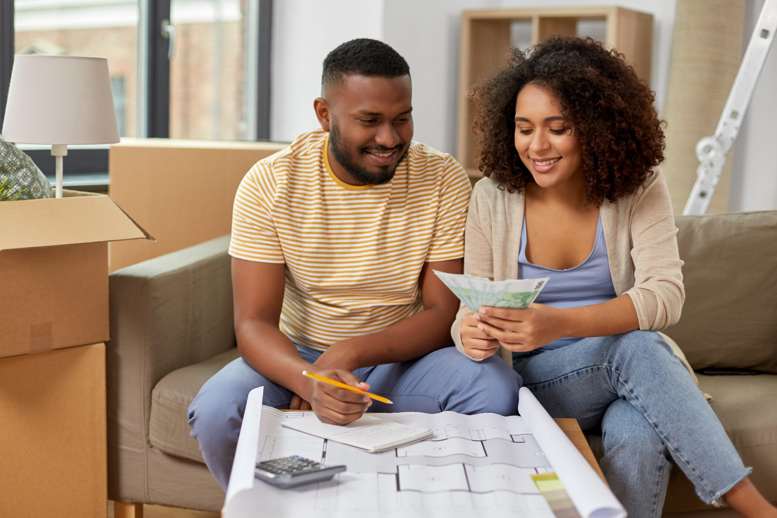A couple discussing moving expenses.