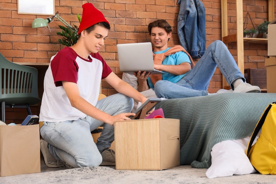 Two young people moving.