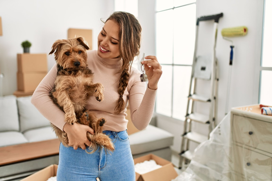 A woman moving with her dog.